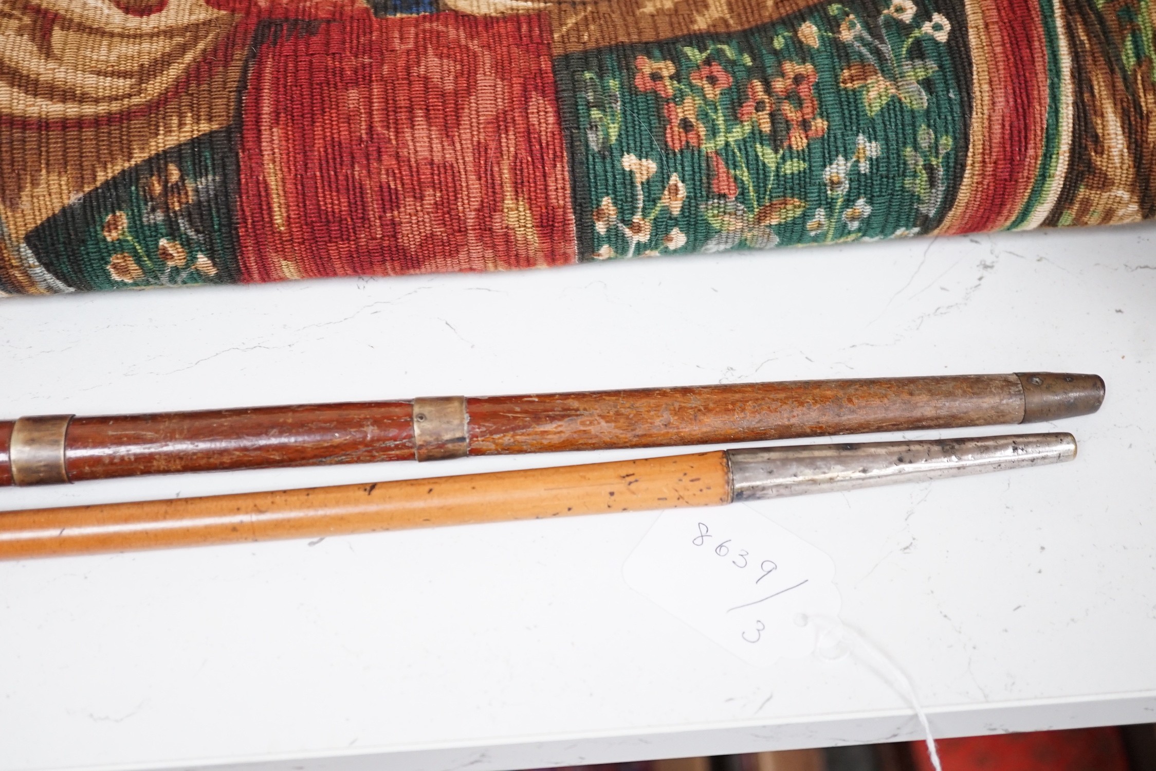 A yellow metal overlay topped walking stick, 91cms long and another (2)